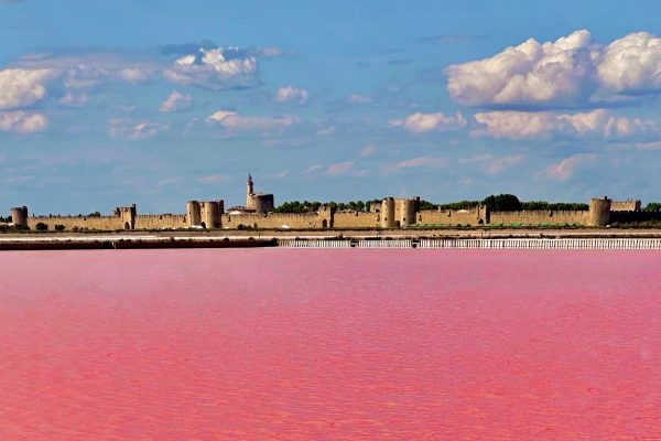 Medieval Town By A Bubblegum Pink Lake: One Of The Last True Hidden Gems In France